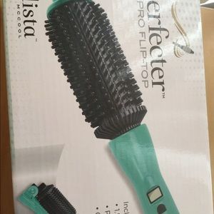 Heated round brush styling tool w/ styling spray